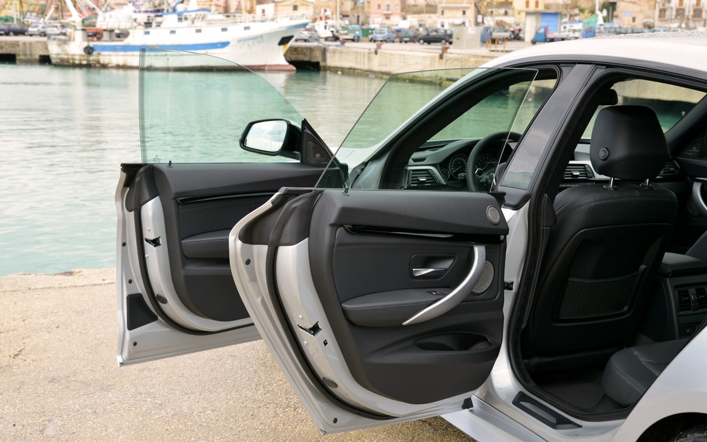 Frameless doors on the 2014 BMW 3 Series Gran Turismo allow for distinctive styling and also let