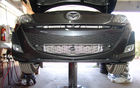 Le sourire de la Mazda3 est un peu &laquo; fake &raquo; puisque seulement la partie du bas sert &agrave; apporter de l&rsquo;air frais au moteur.