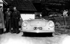 The first Porsche Sports Car- Ferry ,second from the left and his father Ferdinand - third from the left