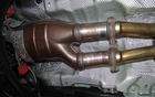 Volvo S60 T6 AWD 2011. D&eacute;tail du syst&egrave;me d'&eacute;chappement.