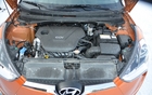 Hyundai Veloster 2012. Quatre cylindres très moderne, 1,6 litre, 138 chevaux accouplé à une boîte automatique à double embrayage à six rapports.