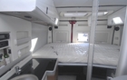 There’s a double bed in the back 
