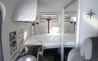 The side panels are rife with storage compartments 