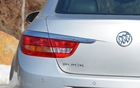 The tail lights are enhanced with chrome 