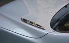 Porthole vents on the hood are a throwback to the 1950s
