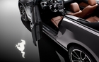 The rearview mirrors project the Mustang emblem