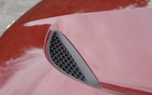 The air intakes on the hood are functional