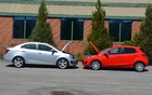 1.4-litre 138-hp turbo in the Sonic versus a 1.5-litre 100-hp engine in the Mazda2. The Sonic won the performance match-up but the Mazda2 has nothing to be ashamed of.