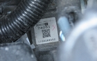 As is the case on most Toyota products, you can scan this QR code to get additional information on the internet. The code is located on the engine. 