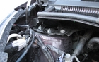  Since the windshield is placed so far forward, the top of the front suspension meets the bottom of the windshield. 
