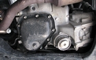 Under the engine, we spotted the tiny oil tank and filter. Emptying the oil is easy, quick and inexpensive, unlike in the smart, which requires you to siphon the oil out the top. 