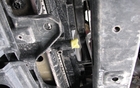 In the centre of the photo, there is a small tap for emptying the cooling liquid (in yellow). 