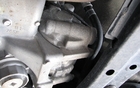 The small CVT transmission is tucked behind the engine. 