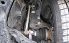 In front, the MacPherson strut suspension does a reasonable job, but its clearance is a little short. 