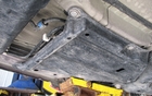  This plastic cover protects the fuel cables that connect to the engine. 