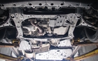 More mechanical parts can be seen at the front end of the vehicle. It would have been wiser to protect them from the elements with a plastic cover, which would also have helped deflect air.  