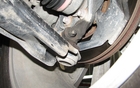  The ball joint is riveted instead of being bolted down, meaning it will be more difficult to change when it’s time to replace it. 