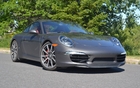 The new 911 is longer, wider and lower than the previous generation