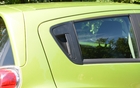 The rear door handles are hidden vertically in the upright.