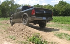 RAM 1500 Laramie. 5.7-litre V8, 4x4 and suspension in Off-Road 2 mode. Even if all the wheels aren’t touching the ground, it works very well.