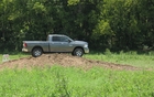 RAM 1500. 4x4 and suspension in Off-Road 2 mode. 50 mm increase in ground clearance.