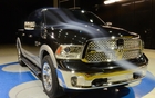 RAM 1500. Improved aerodynamics, quad headlamp design, vertical foglights (photo: Laramie)