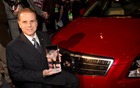 Cadillac Executive Chief Engineer Dave Leone holds the trophy as the Cadillac ATS is named the 2013 North American Car of the Year