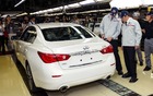 Carlos Ghosn, président de Nissan Motor Co. Ltd., et Johan de Nysschen, président d'Infiniti Motor Company Ltd. 