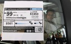 Unlike American labels, pictured here, Canadian fuel efficiency stickers are not legally required to be displayed by dealers.
